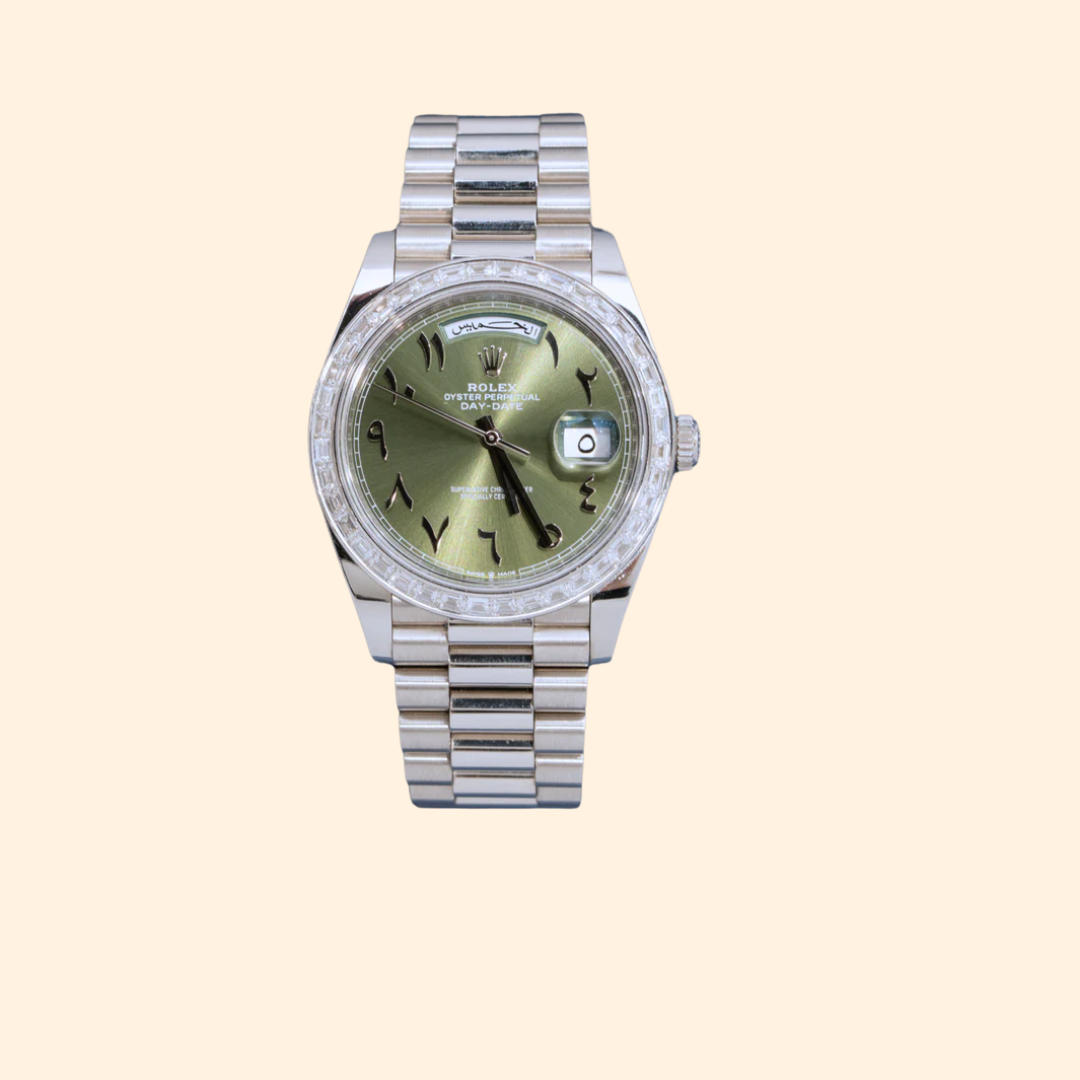 Rolex Day-Date Ref. 228396TBR 40 mm Platinum with Green Arabic Dial and Baguette-Cut Diamond Bezel